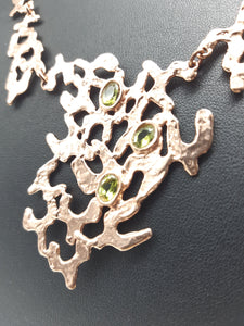 Collana gold plated e peridoti SEGNO